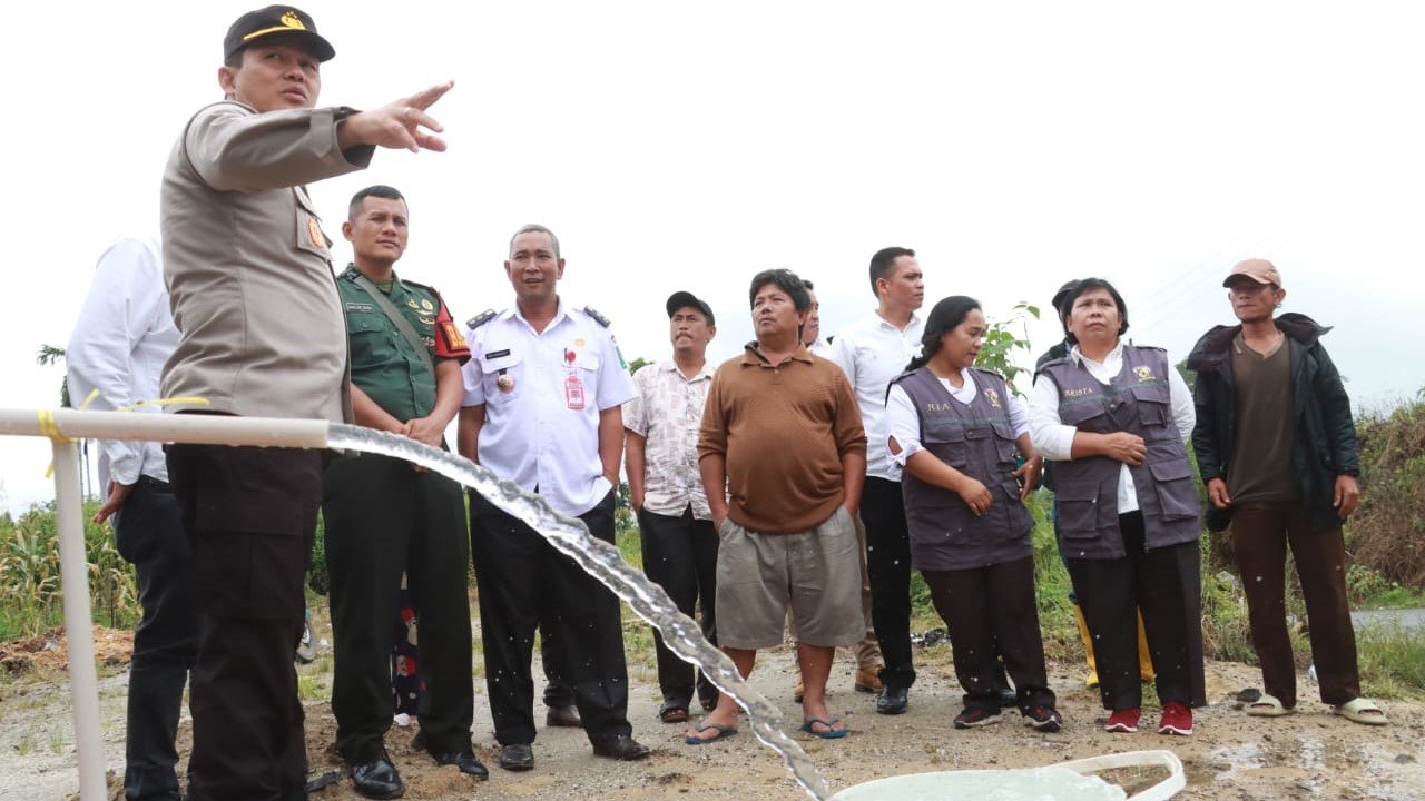 Kapolres Simalungun Salurkan Bantuan Sumur Bor dan Pompa Air ke Masyarkat