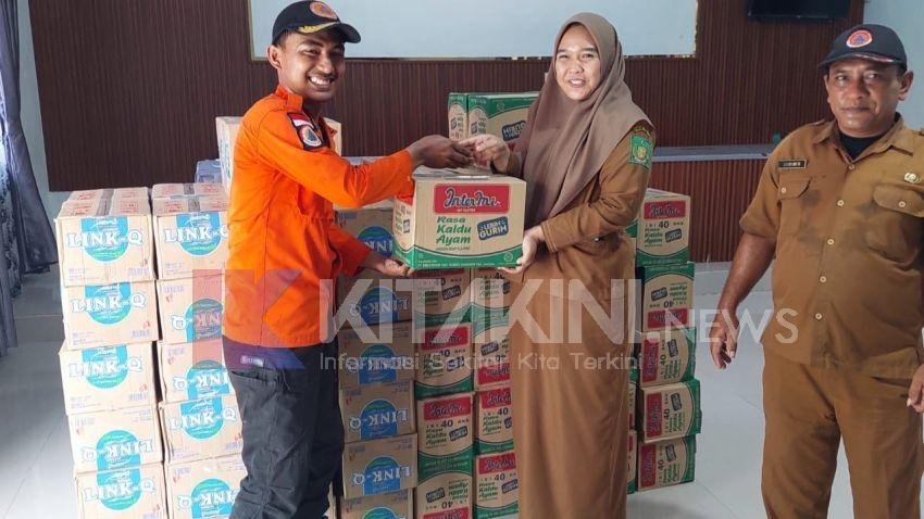 Pj Bupati Langkat Salurkan Bantuan Warga Terdampak Banjir di Babalan dan Seilepan