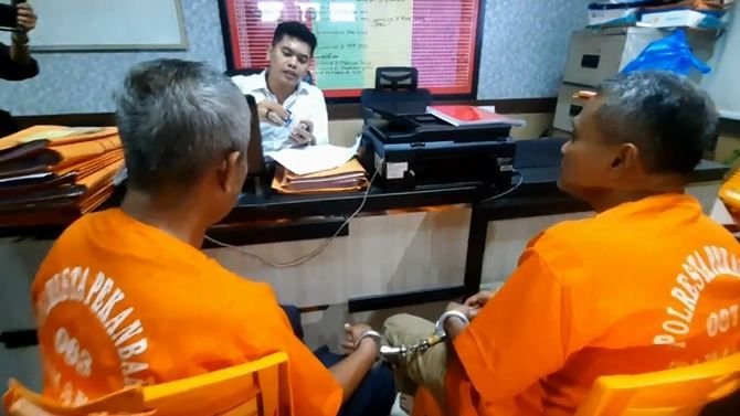 Polresta Pekanbaru Tangkap Dua Spesialis Kejahatan Ganjal ATM