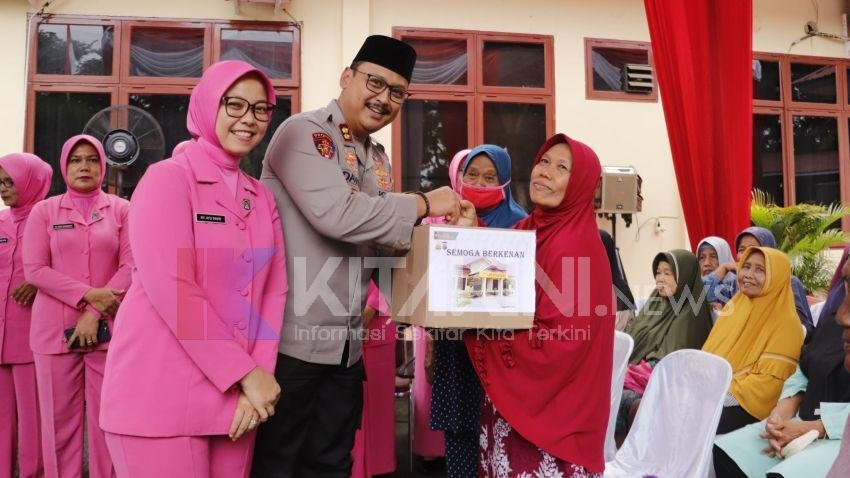 Kapolres Langkat dan Bhayangkari Salurkan 150 Paket Bahan Pokok untuk Kaum Duafa